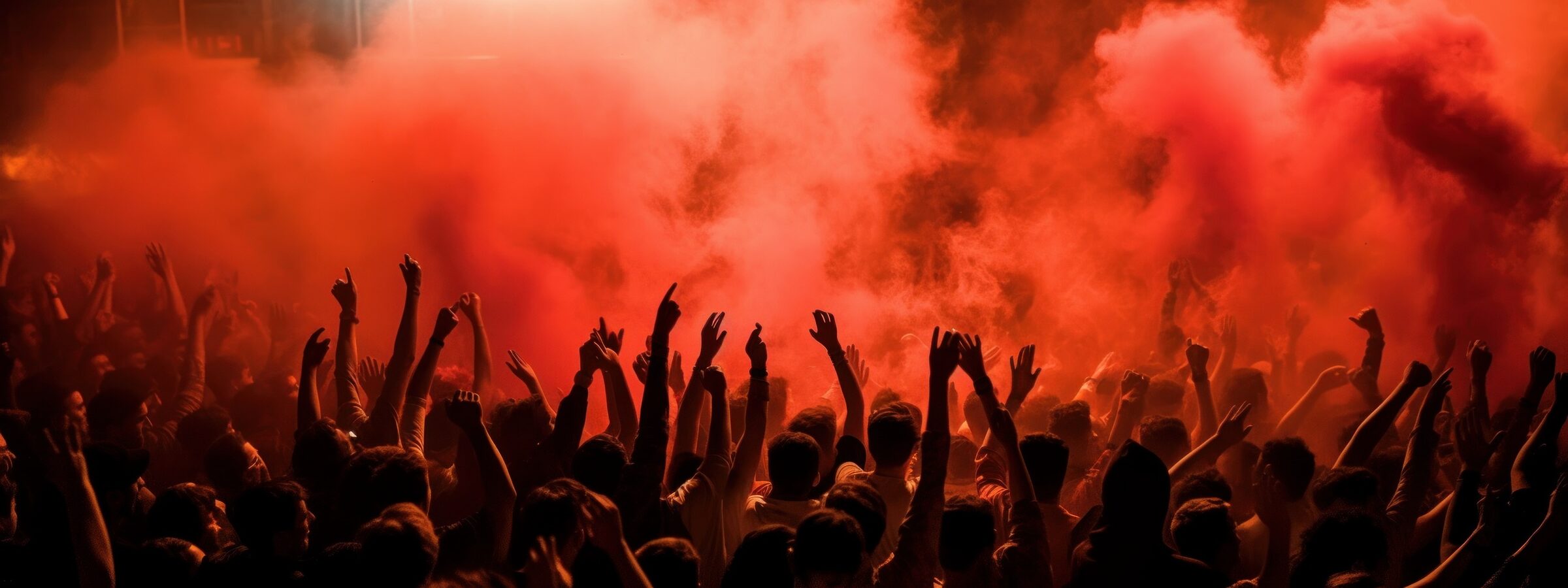 Konzertpublikum mit rotem Bühnenlicht als Keyvisual für Russ Live Services